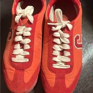 Authentic two toned red Coach Sneakers with White Laces